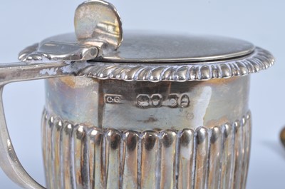 Lot 1074 - A George IV silver mustard pot, of half reeded...