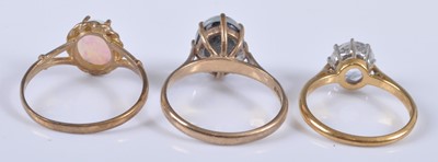 Lot 2654 - Three rings, being a 9ct yellow gold synthetic...