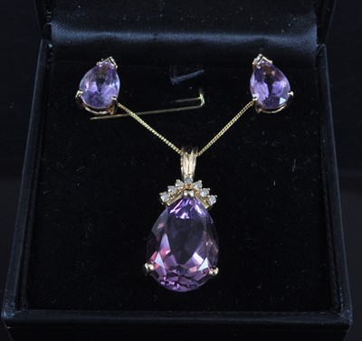 Lot 2656 - A 14ct yellow gold, amethyst and diamond...