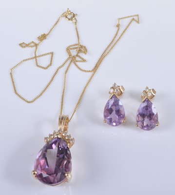 Lot 2656 - A 14ct yellow gold, amethyst and diamond...