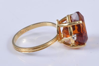 Lot 2663 - A yellow metal, citrine and diamond dress ring,...