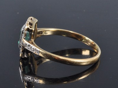 Lot 2682 - A yellow metal, emerald and diamond ring, the...