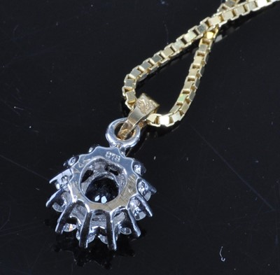 Lot 2697 - An 18ct yellow and white gold, sapphire and...