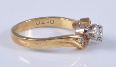 Lot 2668 - A contemporary 18ct gold diamond crossover...