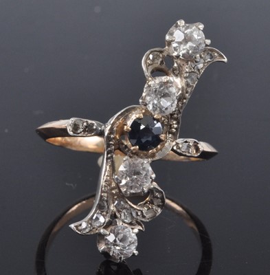 Lot 2669 - A 1920s yellow metal, blue and white sapphire...