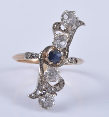 Lot 2669 - A 1920s yellow metal, blue and white sapphire...
