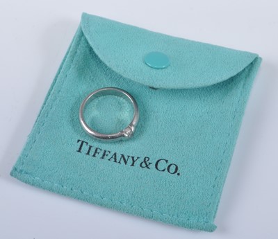 Lot 2683 - A Tiffany & Co platinum diamond solitaire ring,...