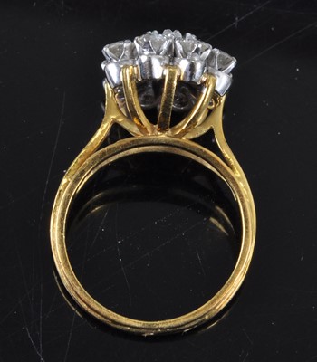 Lot 2703 - An 18ct gold, sapphire and diamond flower head...