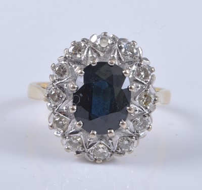 Lot 2704 - A contemporary 18ct gold, sapphire and diamond...