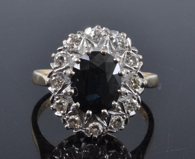 Lot 2704 - A contemporary 18ct gold, sapphire and diamond...