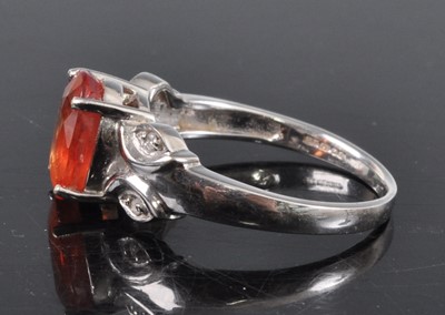 Lot 2705 - A contemporary 18ct white gold, padparadscha...