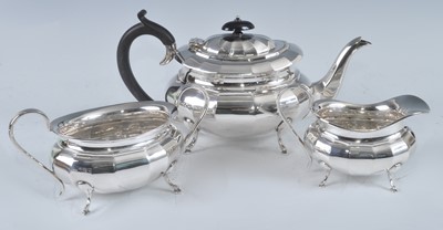 Lot 1116 - A mid-20th century three-piece silver tea...