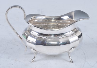 Lot 1116 - A mid-20th century three-piece silver tea...