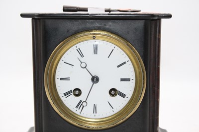 Lot 8 - An Edwardian black slate cased mantel clock...