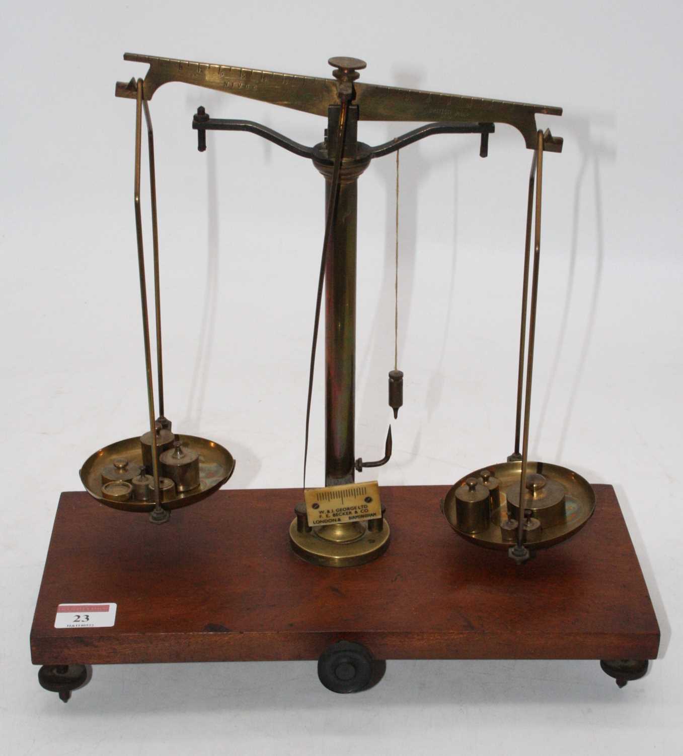 Lot 23 - A set of Victorian brass beam scales, on...