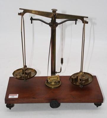 Lot 23 - A set of Victorian brass beam scales, on...
