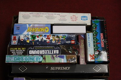 Lot 54 - Two boxes of assorted board games and toys, to...