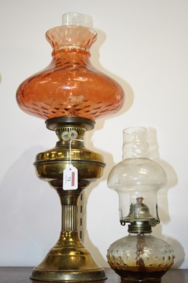 Lot 72 - An early 20th century brass pedestal oil lamp,...
