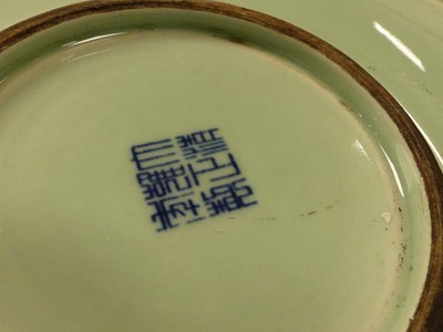 Lot 81 - A Chinese export celadon glazed charger, the...