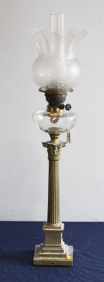 Lot 85 - A Victorian pedestal oil lamp, having an...