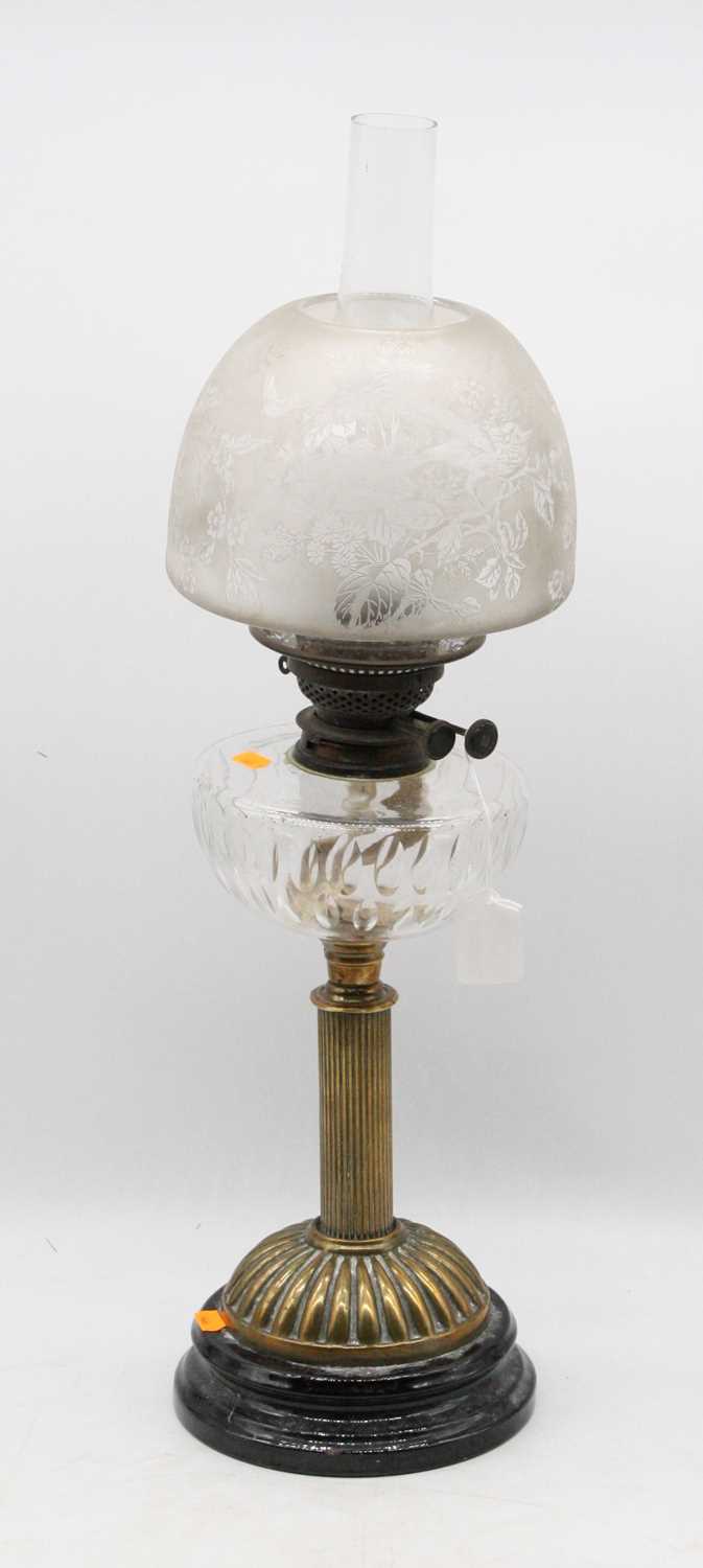 Lot 94 - A late Victorian oil lamp, having etched...
