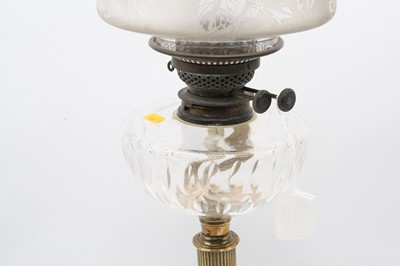 Lot 94 - A late Victorian oil lamp, having etched...