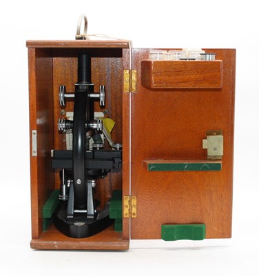 Lot 95 - A 20th century student's monocular microscope,...