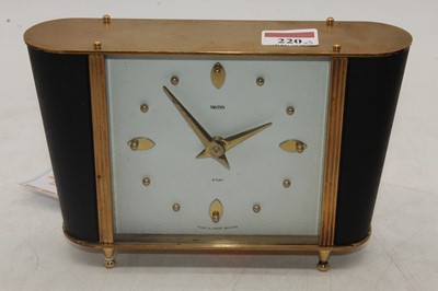 Lot 220 - A 1920s oak mantel clock, height 15cm,...