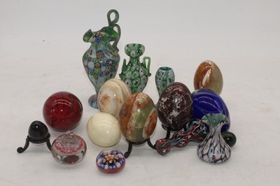 Lot 222 - A collection of polished hardstone eggs...