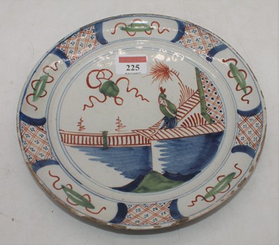 Lot 225 - An 18th century Dutch Delft plate, decorated...