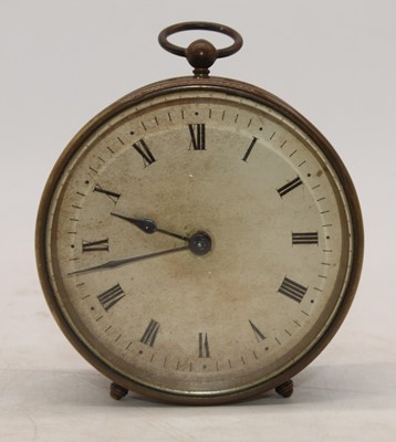Lot 232 - An early 20th century brass cased travel clock,...