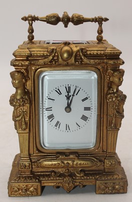 Lot 234 - A 20th century gilt painted carriage clock,...
