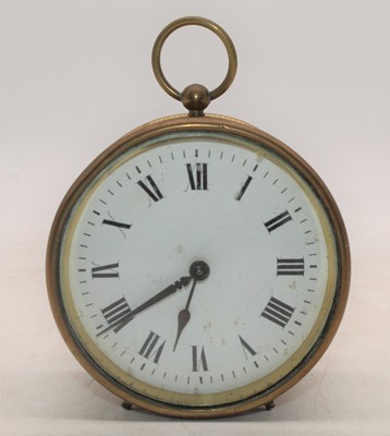 Lot 237 - An early 20th century brass cased travel clock,...