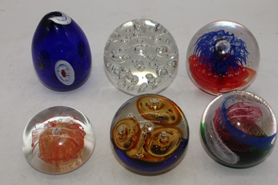 Lot 244 - A collection of six various glass paperweights