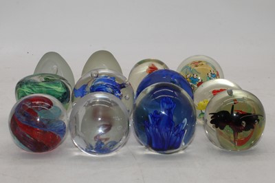 Lot 247 - A collection of 12 various glass paperweights
