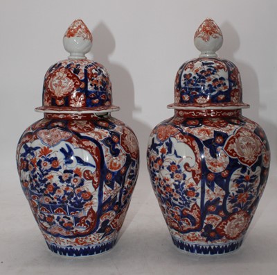 Lot 115 - A pair of Japanese imari porcelain urns, each...