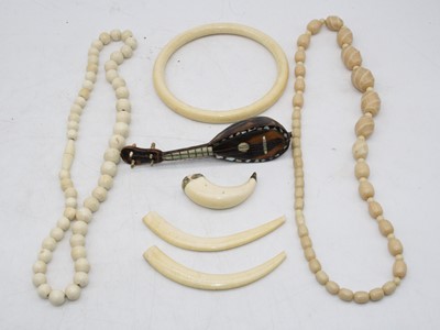 Lot 363 - An early 20th century Indian faux ivory bead...