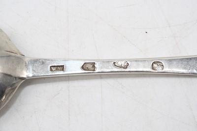 Lot 291 - An 18th century silver serving spoon; together...