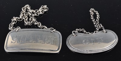 Lot 300 - Two George V silver decanter collars,...