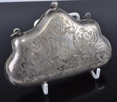Lot 304 - A white metal lady's evening purse, the...