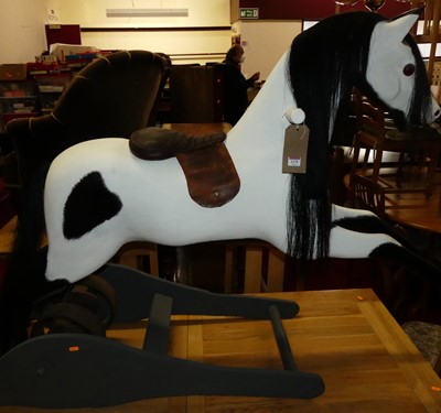 Lot 1324 - A Ragamuffin dapple-grey sprung rocking horse,...