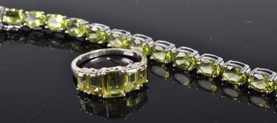 Lot 324 - A white metal and green stone set bracelet,...