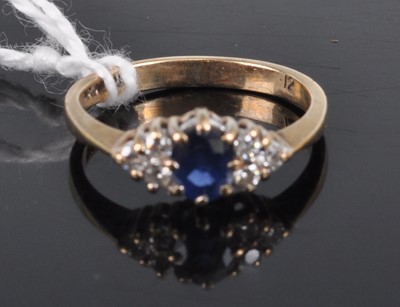 Lot 327 - A 9ct gold, sapphire and diamond dress ring, 1....