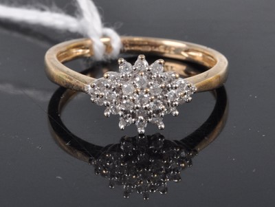 Lot 328 - A modern 9ct gold diamond lozenge cluster ring,...