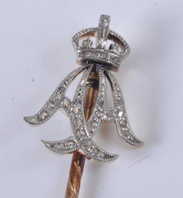 Lot 1196 - Four yellow and white metal diamond set royal...