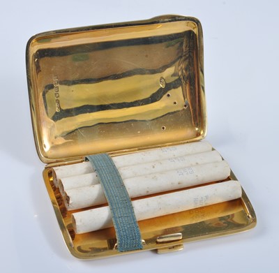 Lot 1212 - An 18ct yellow gold rectangular cigarette case,...