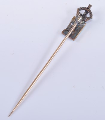 Lot 1199 - A yellow metal royal monogram stick pin,...