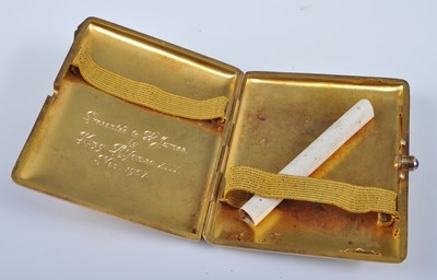 Lot 1213 - A yellow metal rectangular cigarette case,...