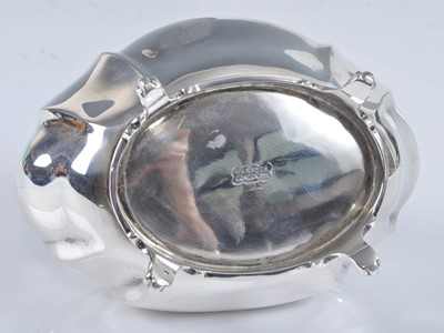 Lot 1105 - A George V silver sugar box, of lidded oval...
