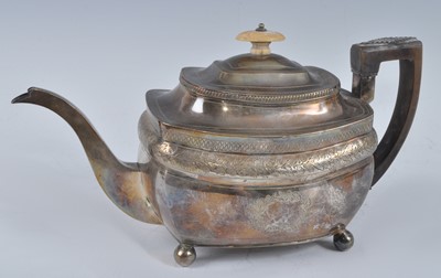 Lot 1071 - A George III silver teapot, of shaped...
